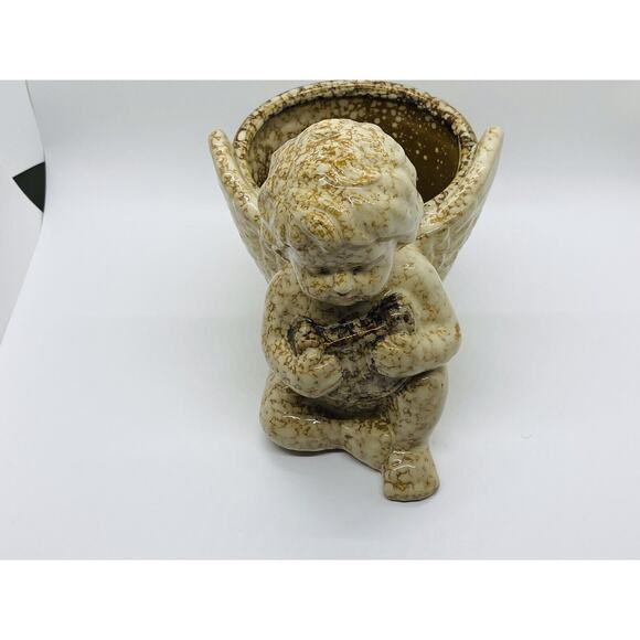 Dimpled Stone Angel Planter With Harp And Wings Extended Around Flower Pot - Picture 3 of 11